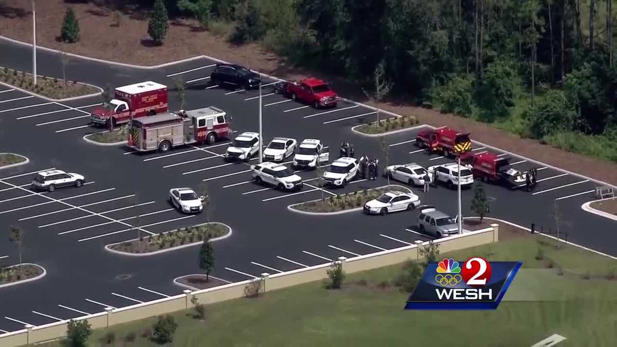 Students banned from high school after shooting threat