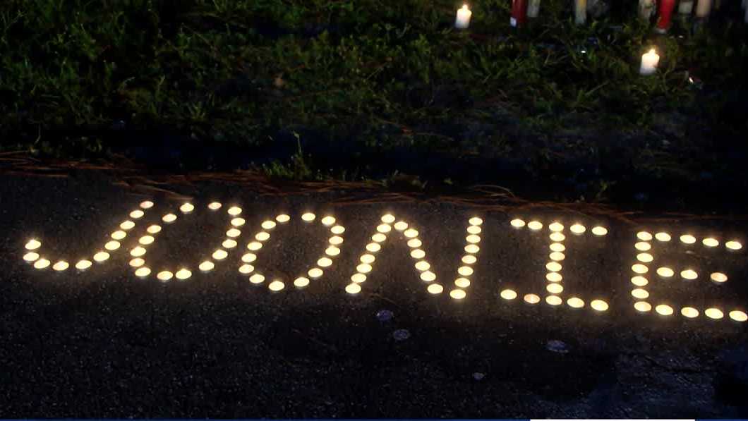 Friends and family hold candlelight memorial for man shot and killed in ...