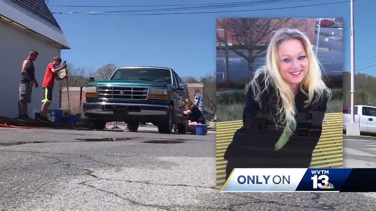 Family washes cars to raise money for mother's funeral