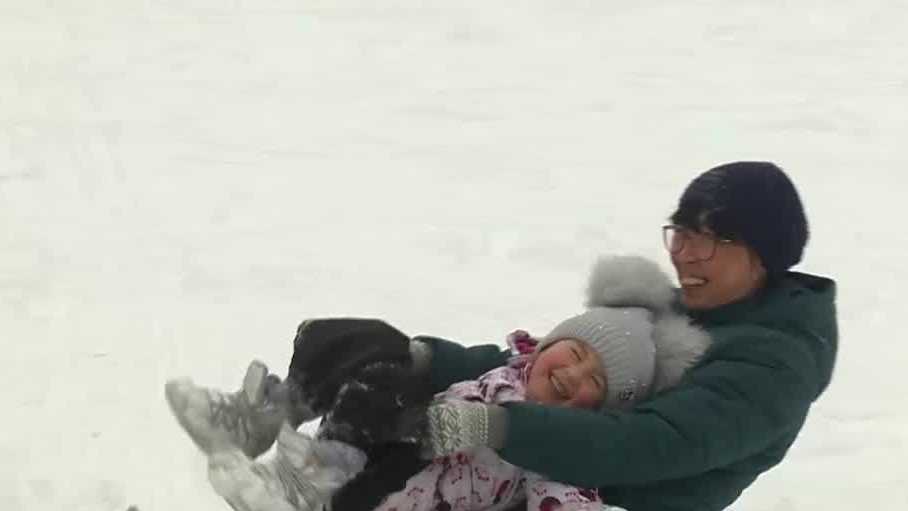Kids, families enjoy snow in final days of winter break