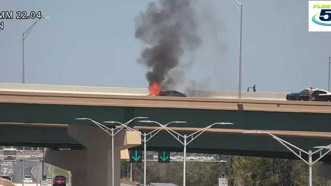 Watch: Firefighters extinguish car fire on Florida’s Turnpike off-ramp