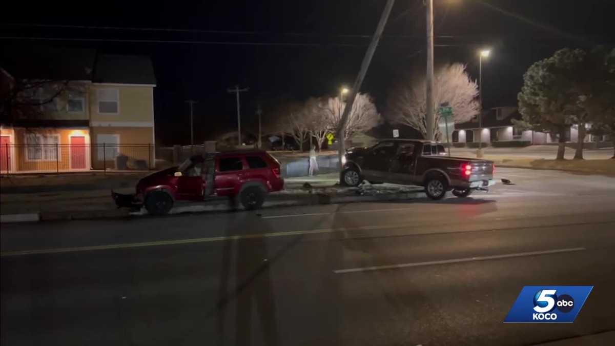 Police detain person who fled after car crashed into light pole