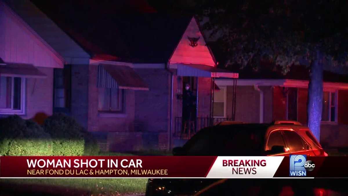 Woman shot while in car