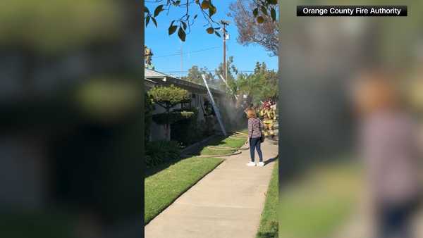 Quick-thinking neighbors and UPS driver save 101-year-old woman from kitchen fire