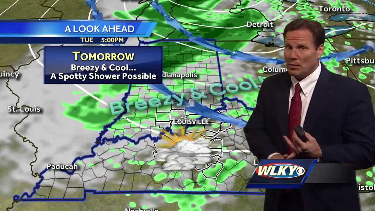 Breezy and cool, a spotty shower possible