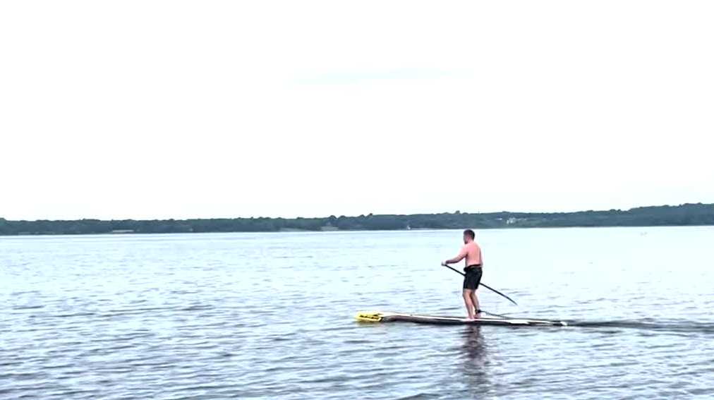Wolfeboro native Allie Skelley paddle boarded 35 miles off Rhode Island