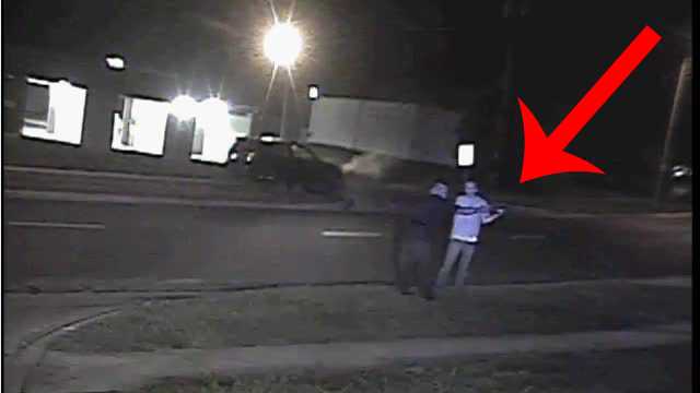 Watch: Suspect pulls gun on officer, struggle over weapon ensues