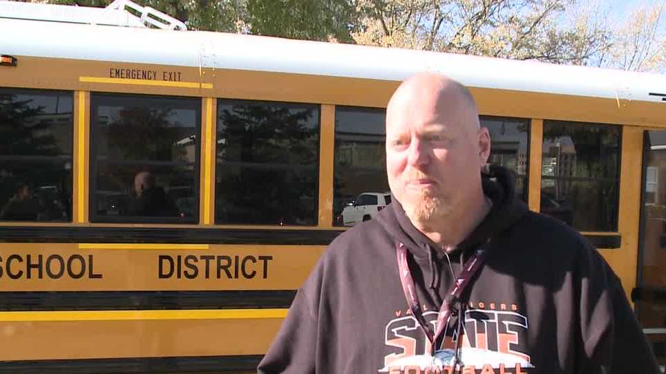 Iowa school superintendent drives pep bus to state football semifinal