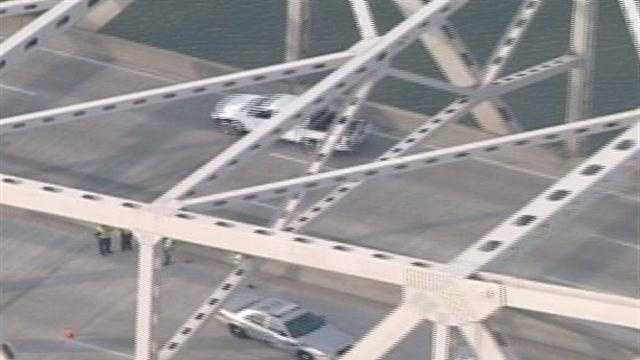 Woman Jumps From Vehicle On Bridge