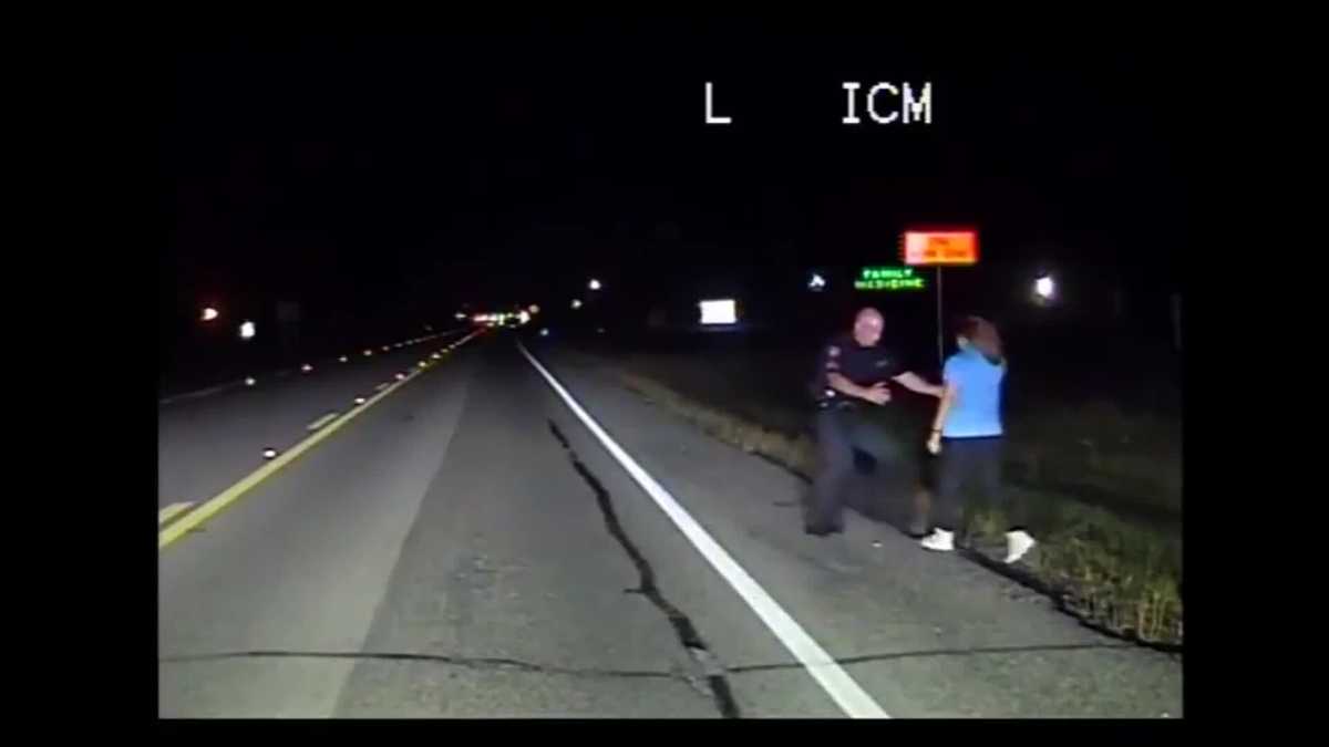 Police Dash Cam Captures Woman Sleeping On Side Of The Road 