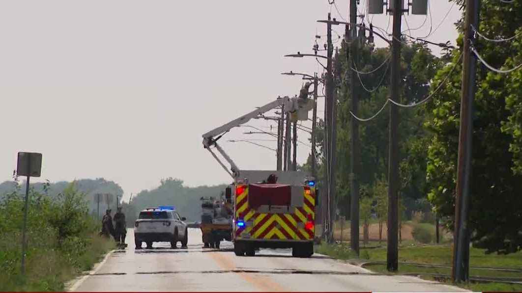 Des Moines crash damages utility pole, sparks grassfire