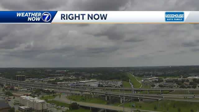 Cloudy and breezy afternoon with rain west