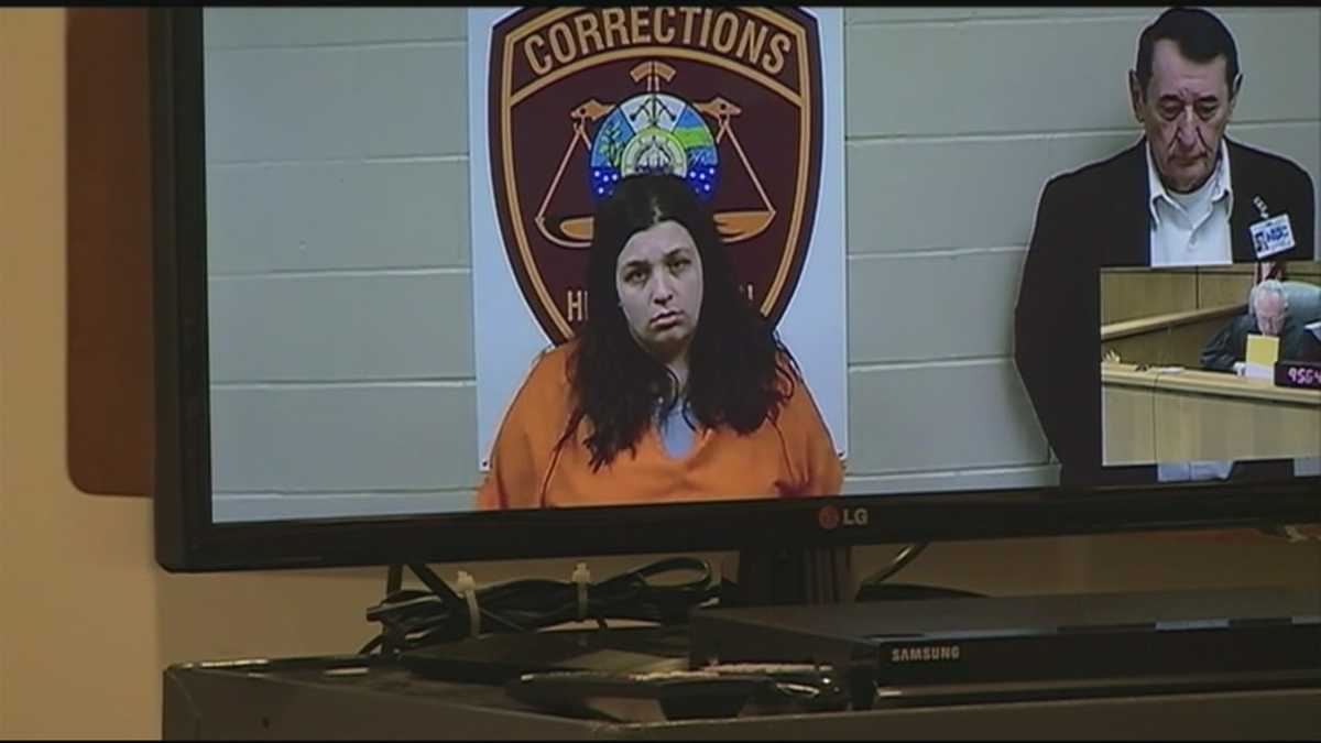 Woman arraigned in bank robbery case