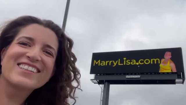 Woman advertises for a husband on highway billboards