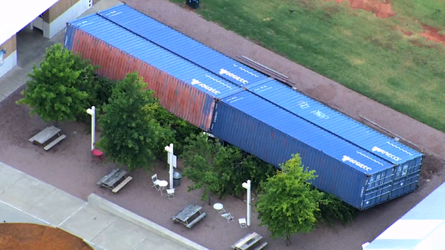 Storms knock over giant shipping containers at OKC's Wheeler Park