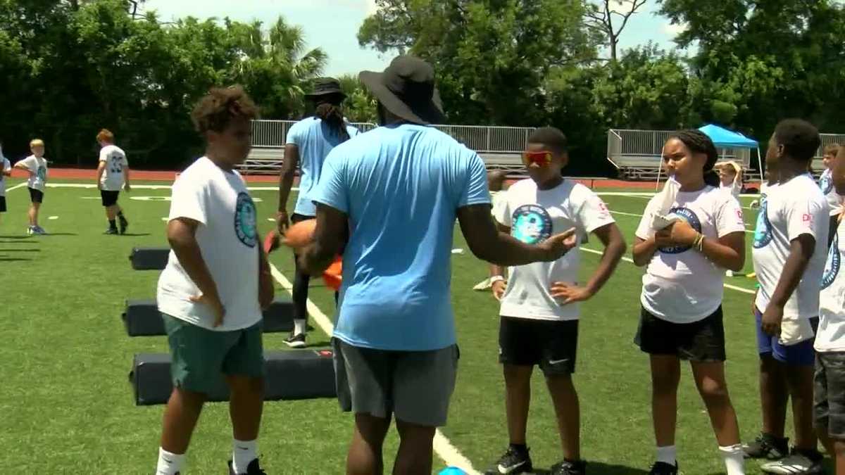 Former NFL player Tre Boston gives back to youth at 5th annual Beyond Belief football camp