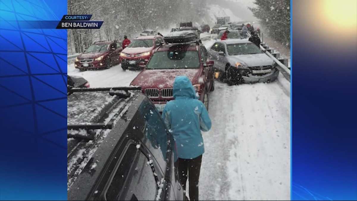 Blizzardlike snow squall causes massive pileup