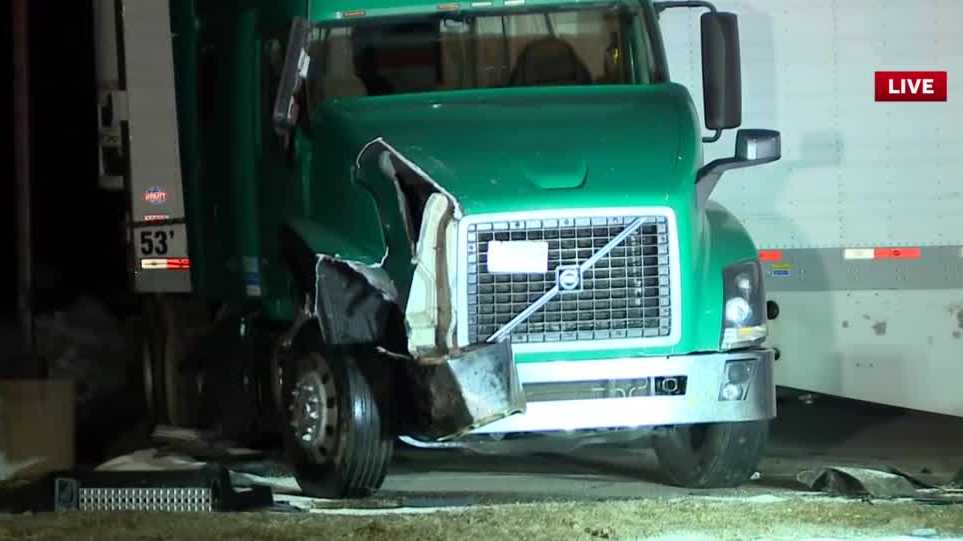 Tractor-trailer hits state liquor store