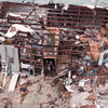 Suspect turns himself in after deadly warehouse explosion in Sand Springs