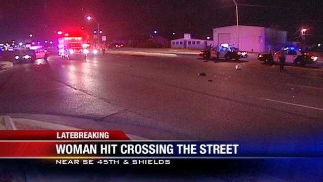 Woman hit while crossing the street
