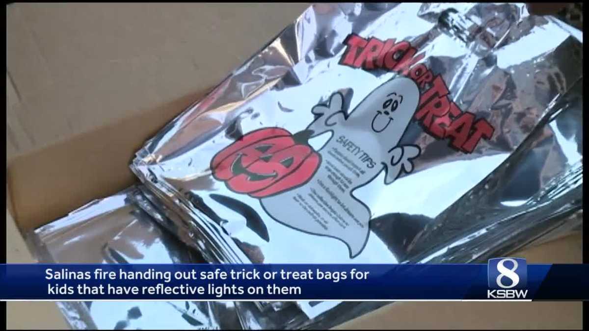 Salinas firefighters handout reflective trick-or-treat bag