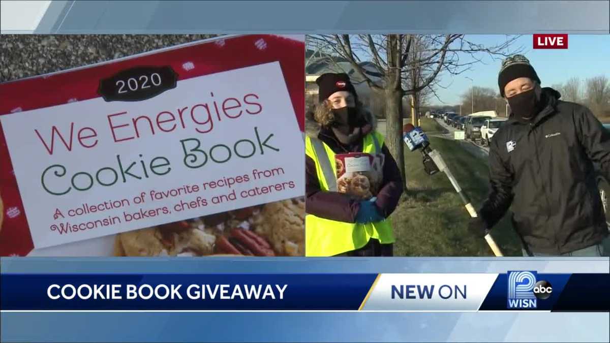 We Energies distributes holiday Cookie Book at Miller Park