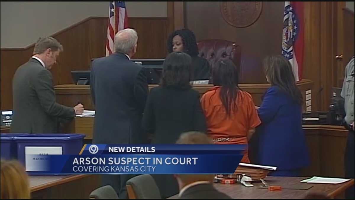 Woman charged with arson in firefighter deaths appears in court