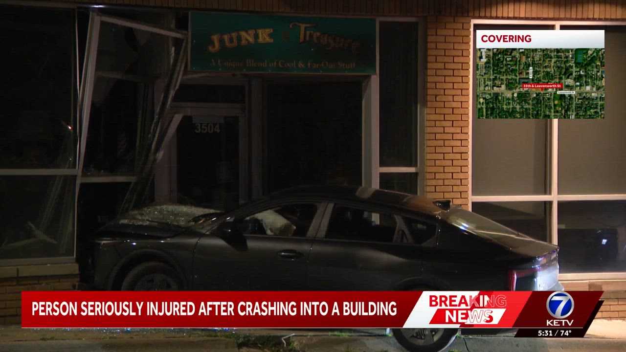 Driver hospitalized after crashing into building