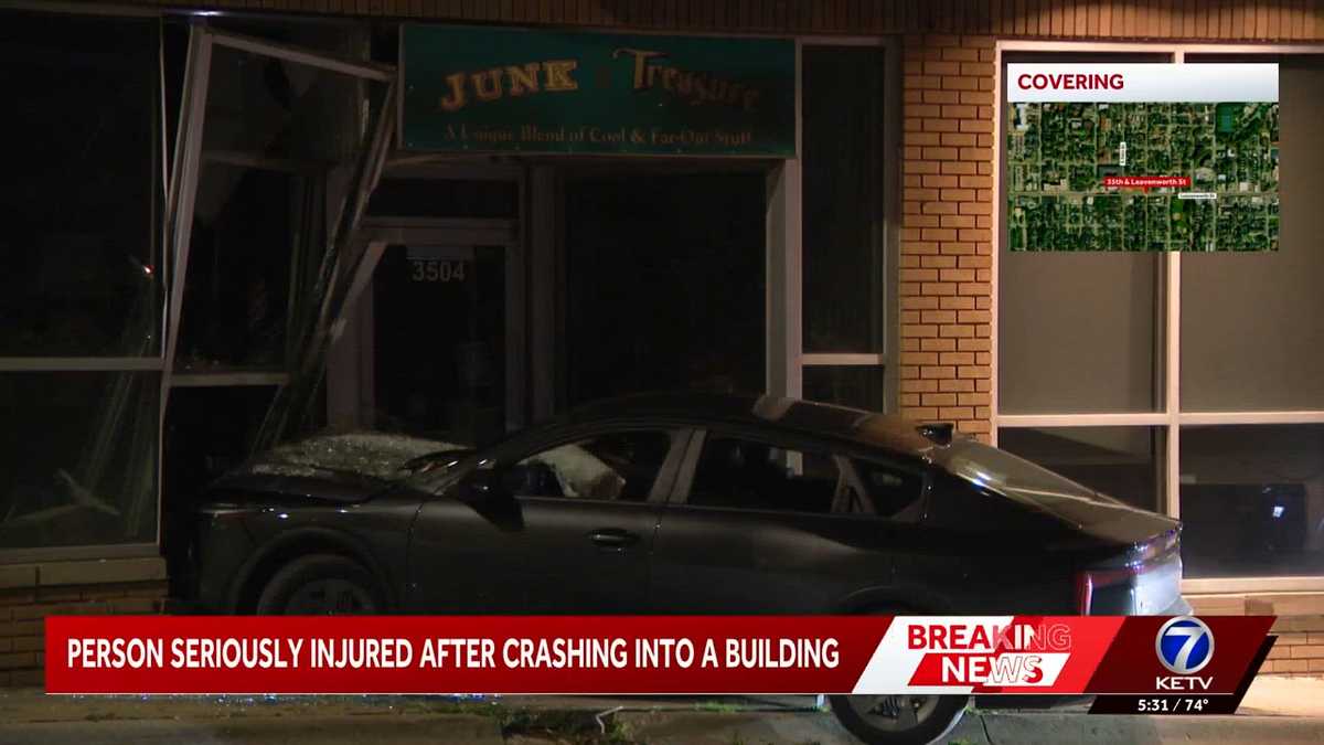 Driver hospitalized after crashing into building