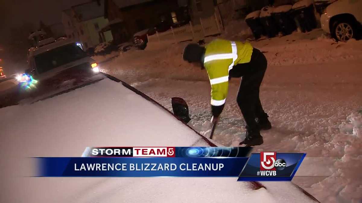 Lawrence digging out from official blizzard