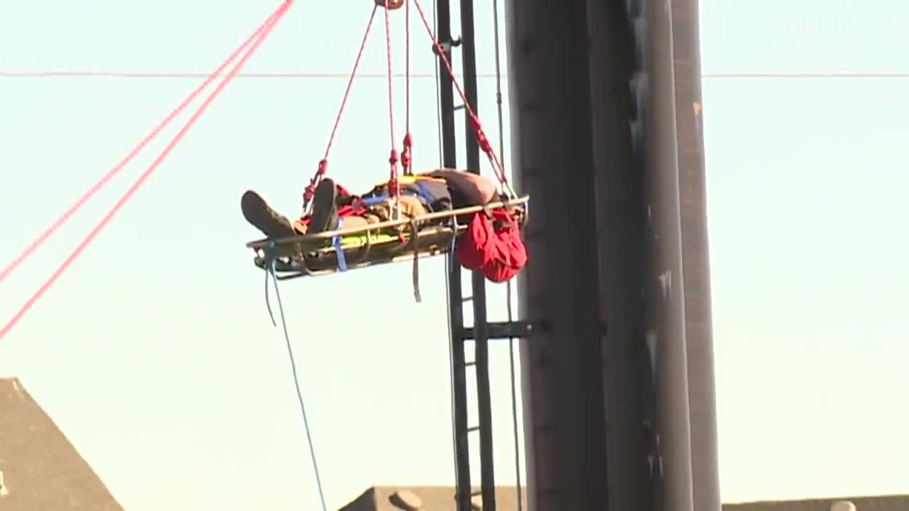 koco.com - Josh Wallace - WATCH: OKC fire crews rescue worker suffering medical emergency on billboard