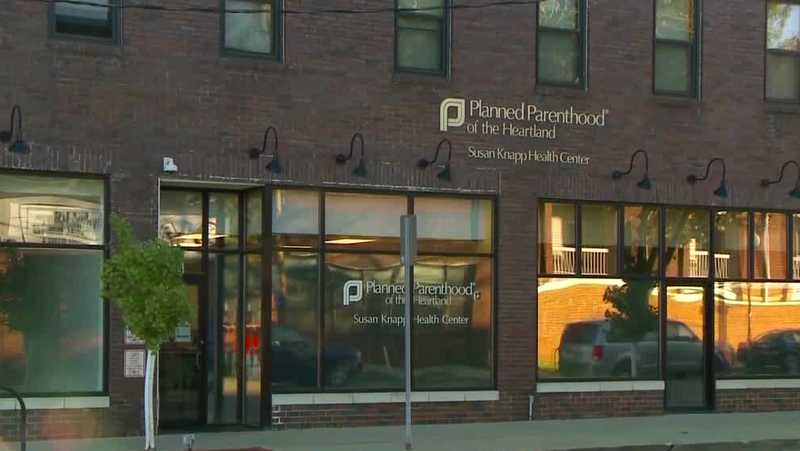 After years of fighting Iowa's strict abortion law, clinics also prepared to follow it