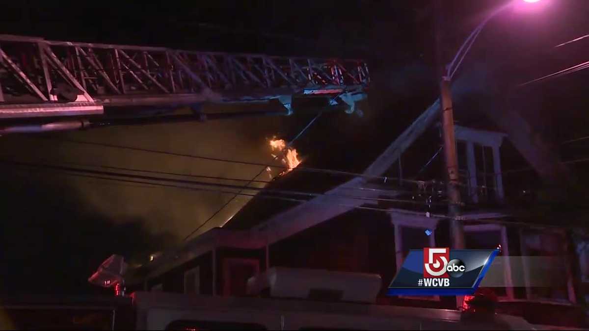 Firefighters rescue family from burning home