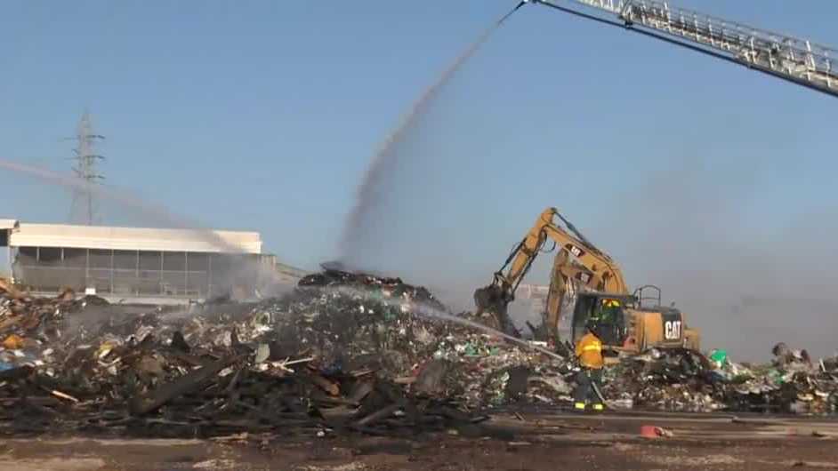 Crews battle wind-driven fire at Sacramento public disposal site