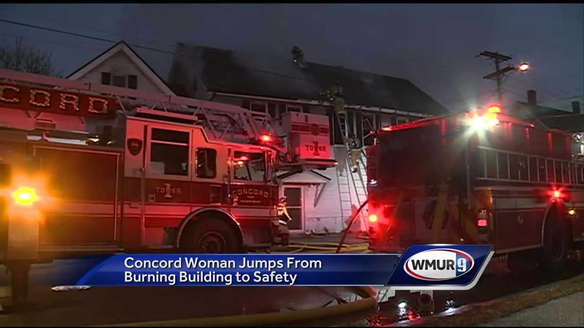 Woman jumps from window to escape burning building