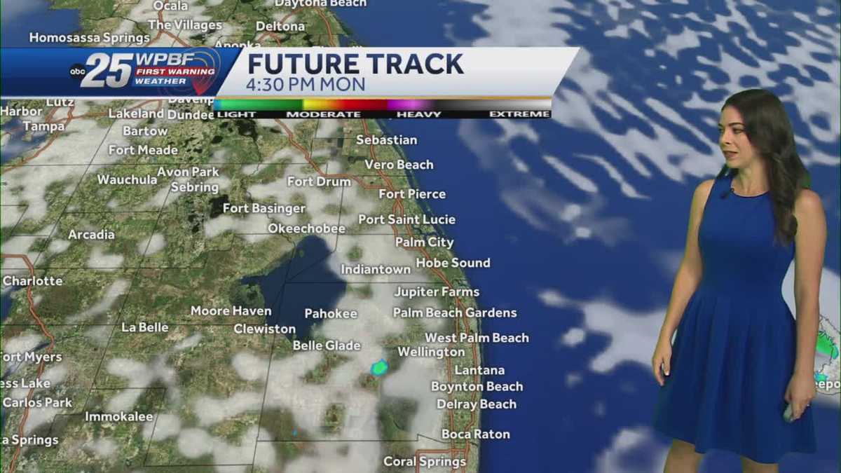Breezy and isolated coastal showers