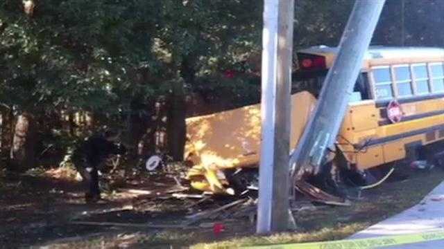 Raw Video: School bus hits power pole