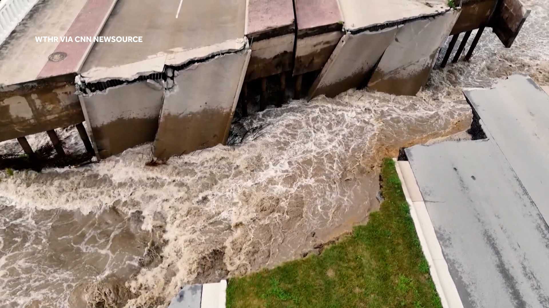 Drone video: Bridge ripped apart by floodwaters in Indiana