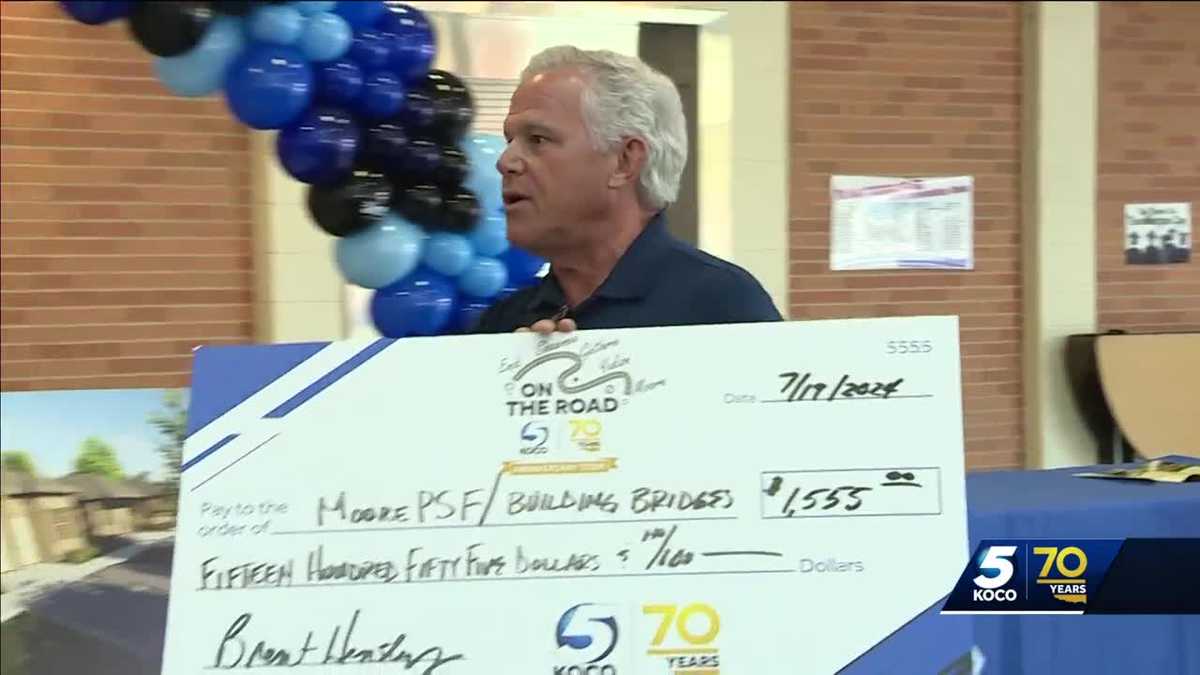 KOCO 5 General Manager Brent Hensley donates to Moore charity