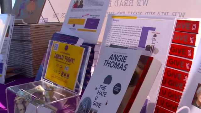 Volunteer group hands out banned books at Johnston Farmers Market - Vimarsana News