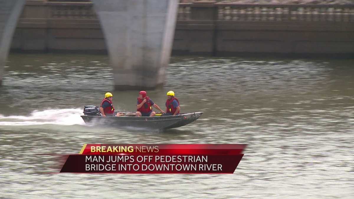Man rescued from river after jump off pedestrian bridge