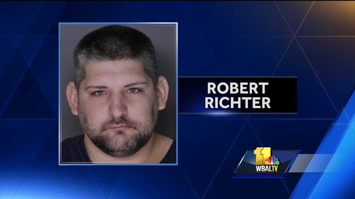 Video: Robbery suspect caught by funeral director charged