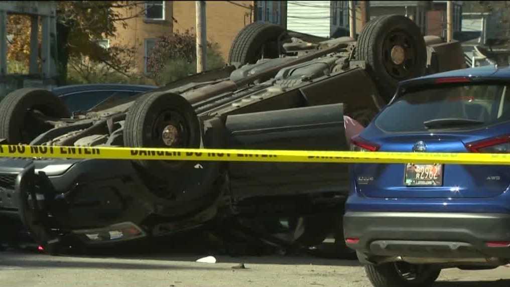 McKeesport police car crashes, rolls onto roof