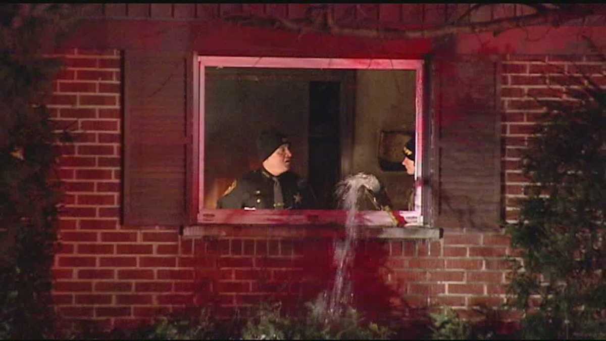 Crews battle fire and bitterly cold temperatures