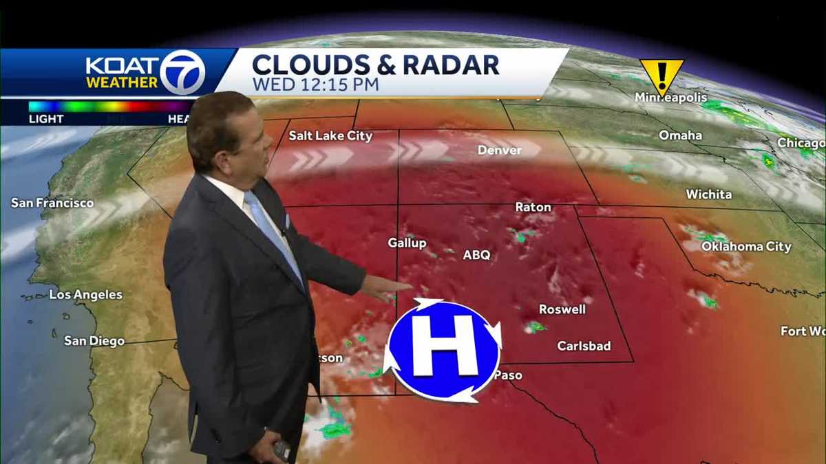 Building heat wave with scattered storms east