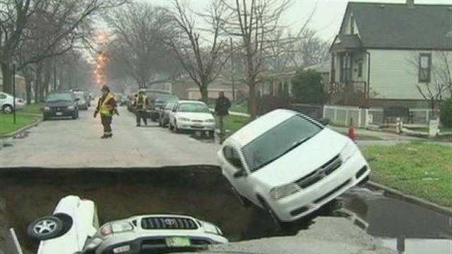 VIDEO: Car falls into sinkhole