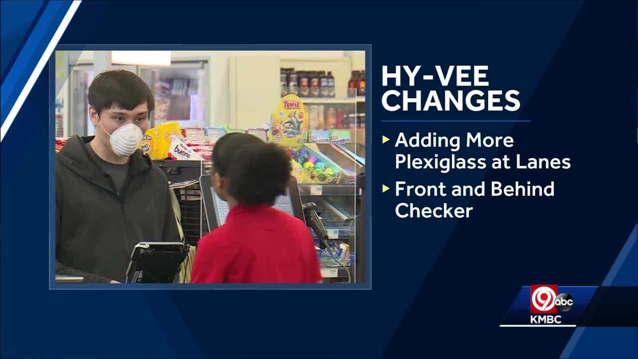 Hy-Vee using one-way directional signs in aisles to help protect customers