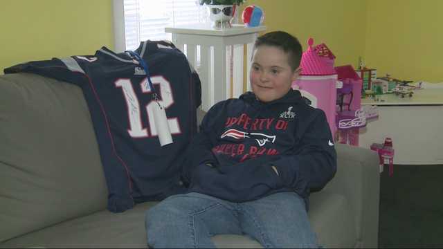 Tom Brady brings boy with Down syndrome on victory parade
