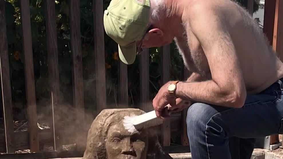 San Francisco couple discovers mystery buried sculpture in backyard - KCRA image