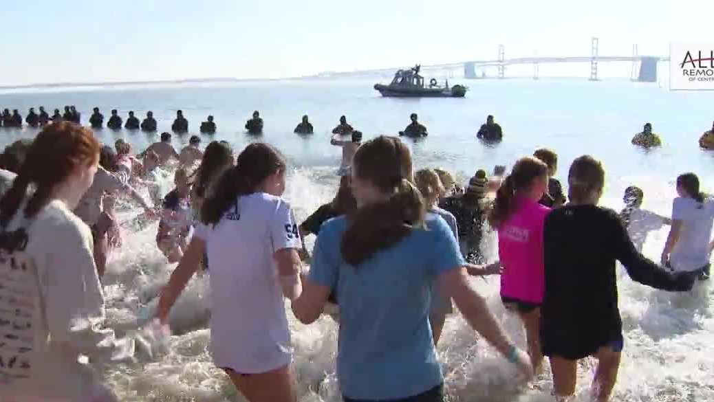 Students brave cold for Cool Schools Plunge for Special Olympics Maryland